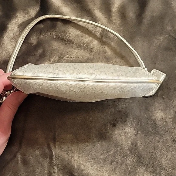Elegant Coach White and Silver Wristlet